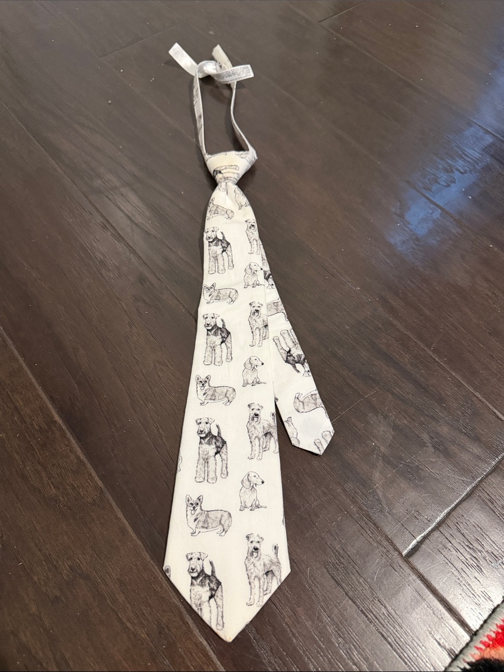 Janie and Jack Cream Tie with Black Dog Sketches